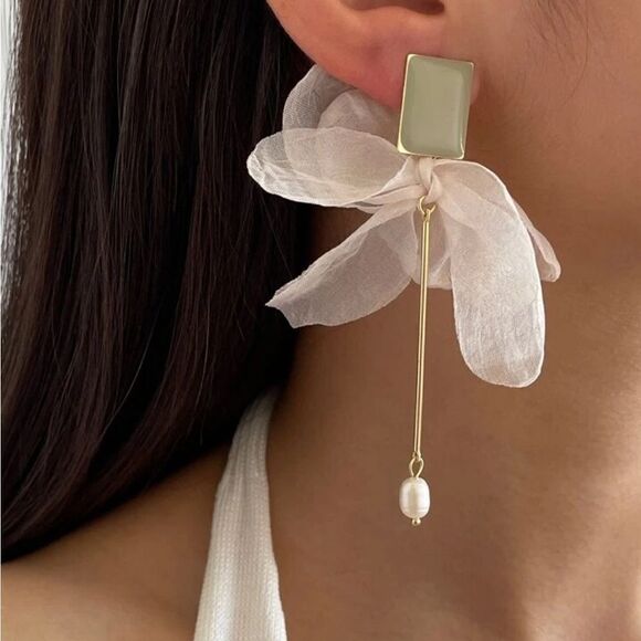 Anthropologie Jewelry - Bohemian bow earrings M83